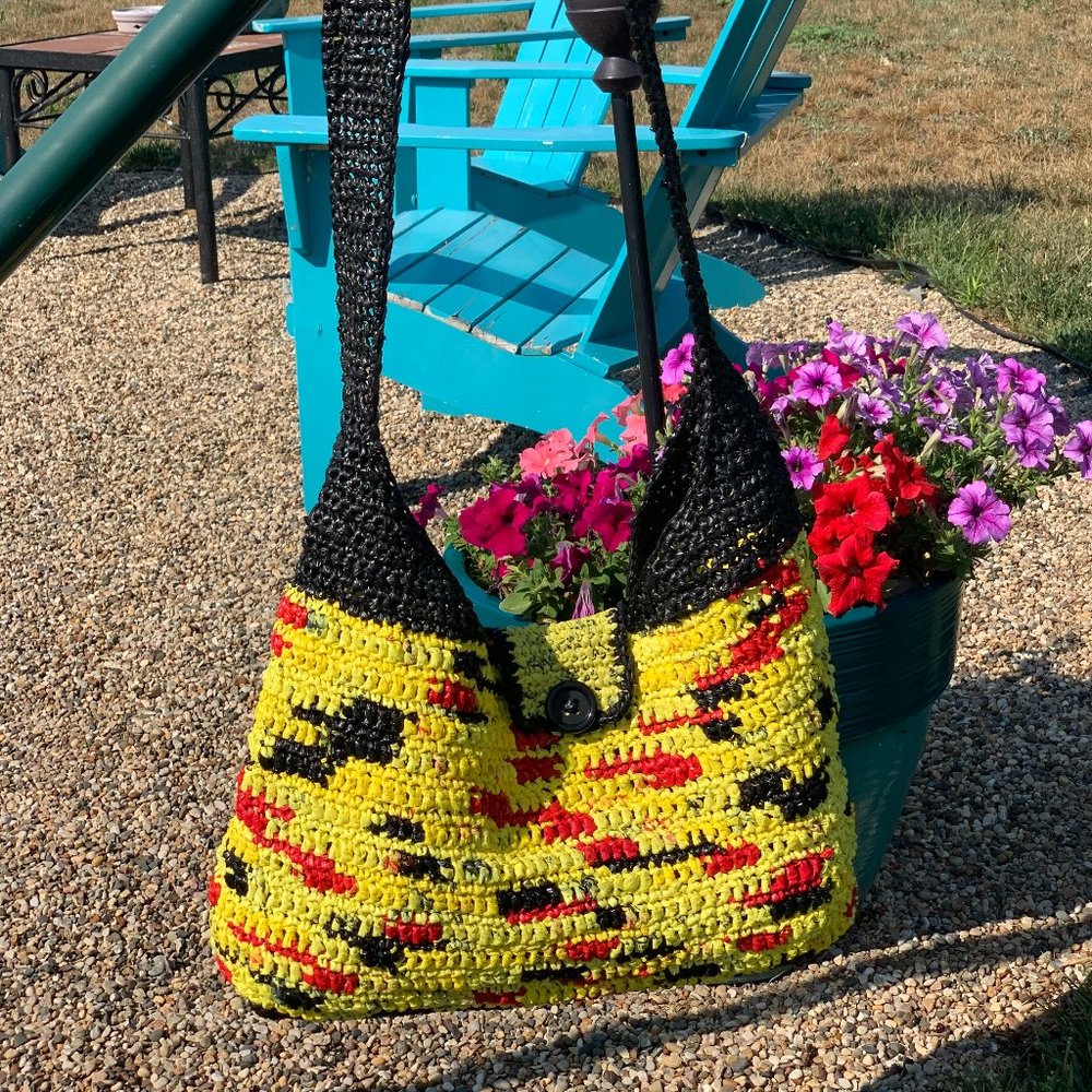 Crochet plarn crossbody bag.  Handmade from recycled retail plastic bags.